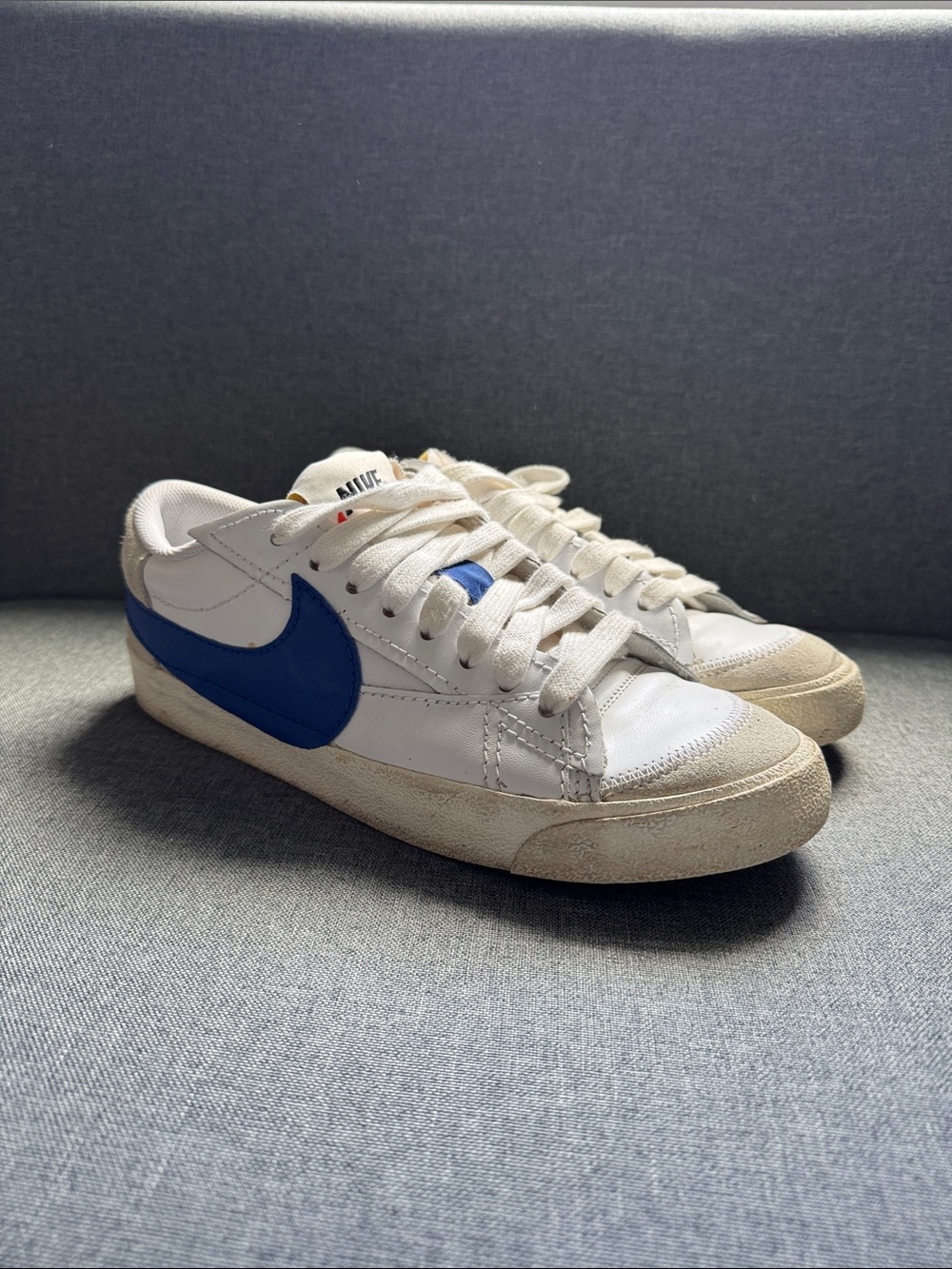 Nike White Sneakers with Blue Swoosh